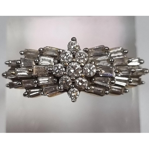 339 - 18ct gold multi cluster diamond ring, with repeating baguette design.  7.6g approx.  size O.  (B.P. ... 