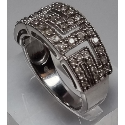 342 - 9ct white gold Greek Key design diamond ring.  6.3g approx.  Size N.  (B.P. 21% + VAT)