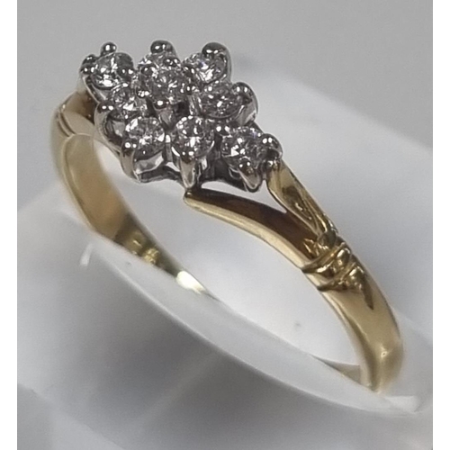 351 - 18ct gold nine stone diamond ring of flowerhead form.  2.8g approx.  Size L1/2.  (B.P. 21% + VAT)