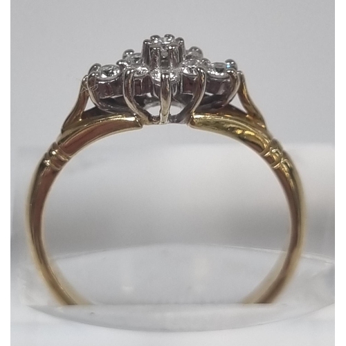 351 - 18ct gold nine stone diamond ring of flowerhead form.  2.8g approx.  Size L1/2.  (B.P. 21% + VAT)