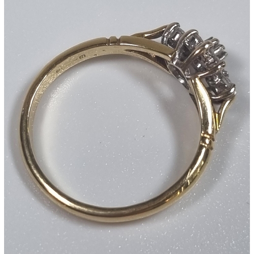 351 - 18ct gold nine stone diamond ring of flowerhead form.  2.8g approx.  Size L1/2.  (B.P. 21% + VAT)