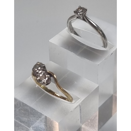 353 - 18ct gold and platinum twist shank two stone diamond ring.   2.2g approx.  Size L.  together with an... 