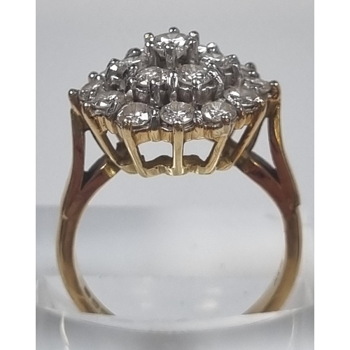 356 - 18ct gold multi cluster diamond ring, the stepped decoration set with approximately 20 diamonds.  6.... 