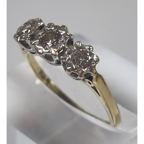 359 - 18ct gold three stone diamond ring in crown setting, the central stone 0.30 carat.  2.9g approx.  Si... 