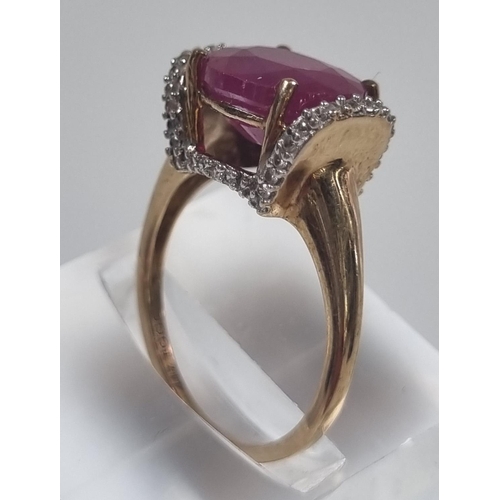 367 - 9ct gold ruby and diamond ring.  3.6g approx.  Size L.   (B.P. 21% + VAT)