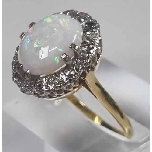 369 - 18ct gold opal and diamond ring.  4.8g approx.  Size P1/2.  (B.P. 21% + VAT)