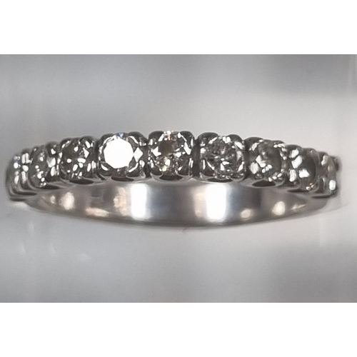 371A - White metal half hoop ten stone diamond eternity ring.  3.3g approx. Size M.  (B.P. 21% + VAT)