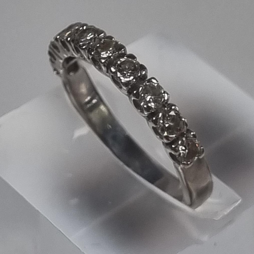 371A - White metal half hoop ten stone diamond eternity ring.  3.3g approx. Size M.  (B.P. 21% + VAT)