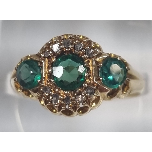 372 - 18ct gold diamond and emerald ring. 3.6g approx.  Size O  (B.P. 21% + VAT)