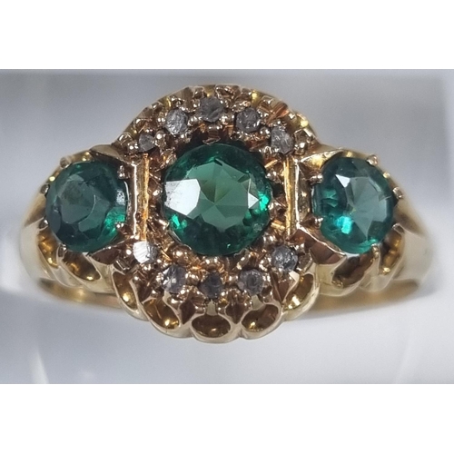 372 - 18ct gold diamond and emerald ring. 3.6g approx.  Size O  (B.P. 21% + VAT)