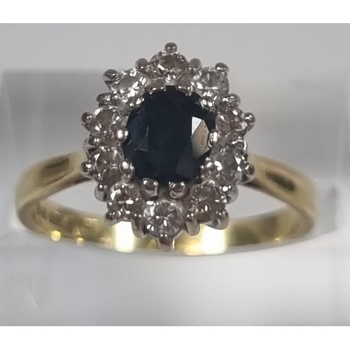 372A - 18ct gold sapphire and diamond cluster ring.  4.4g approx. Size N.  (B.P. 21% + VAT)