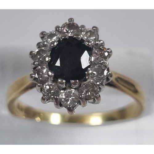 372A - 18ct gold sapphire and diamond cluster ring.  4.4g approx. Size N.  (B.P. 21% + VAT)