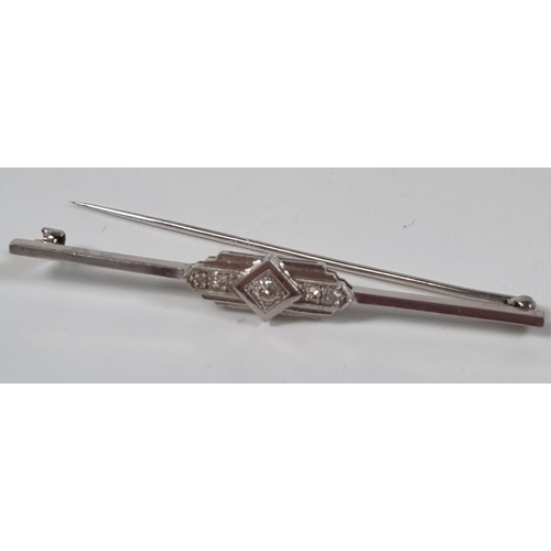 383 - White metal Art Deco design geometric bar brooch inset with five diamonds.  4.1g approx.  6cm long a... 