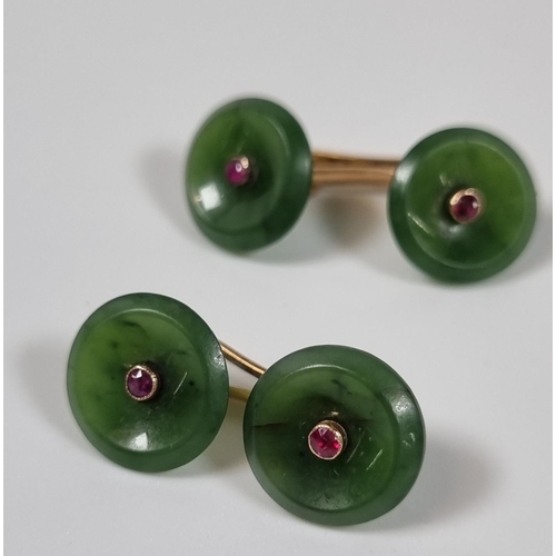 386 - Pair of French ruby and jade cufflinks of circular moulded form inset with rubies.  (B.P. 21% + VAT)