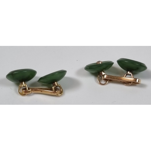 386 - Pair of French ruby and jade cufflinks of circular moulded form inset with rubies.  (B.P. 21% + VAT)