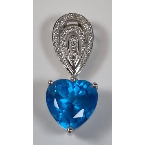 391 - 18ct white gold diamond and blue topaz heart shaped pendant.  4.7g approx.  3.3cm long approx.  (B.P... 