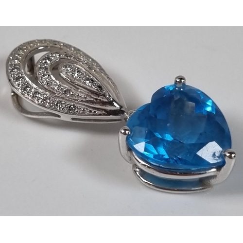 391 - 18ct white gold diamond and blue topaz heart shaped pendant.  4.7g approx.  3.3cm long approx.  (B.P... 