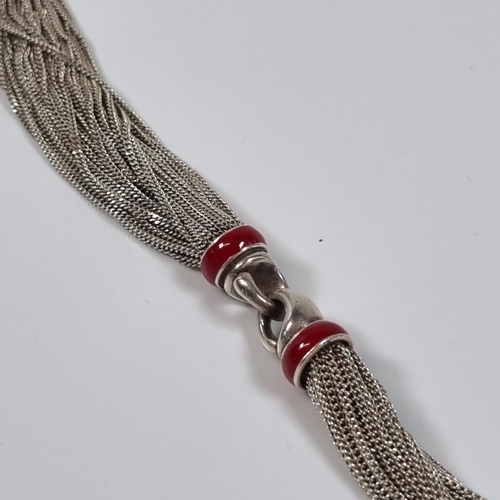 395 - Tiffany & Co. Sterling silver red enamel multi strand bracelet in original box.  (B.P. 21% + VAT)