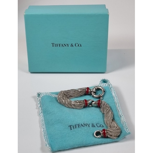 395 - Tiffany & Co. Sterling silver red enamel multi strand bracelet in original box.  (B.P. 21% + VAT)