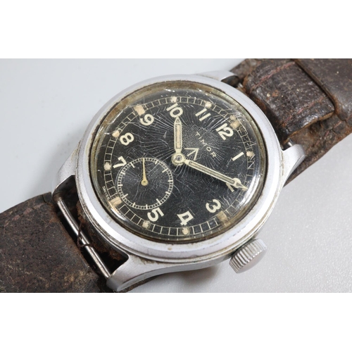 401 - Timor British Military stainless steel 'Dirty Dozen' wristwatch, having Arabic numerals to the black... 