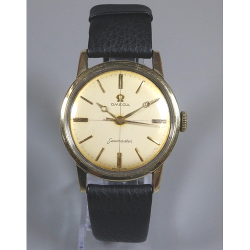 406 - Omega Seamaster gold plated gentleman's wristwatch with satin face having baton numerals and associa... 