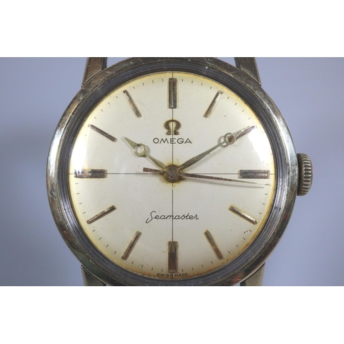 406 - Omega Seamaster gold plated gentleman's wristwatch with satin face having baton numerals and associa... 