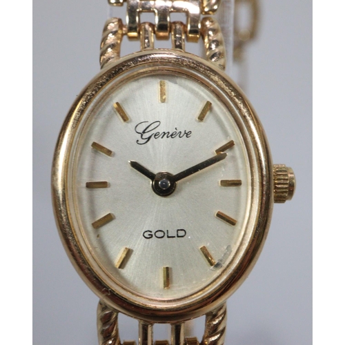 412 - 9ct gold Geneve oval ladies bracelet wristwatch with satin face, having baton numerals and bar link ... 