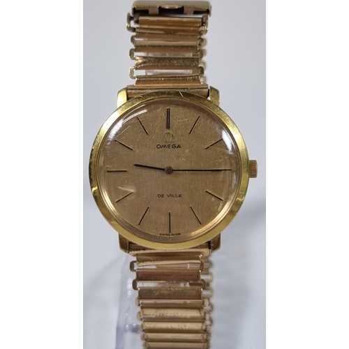 416 - Omega De Ville gold plated gentleman's wristwatch with gold satin face, having baton numerals on an ... 