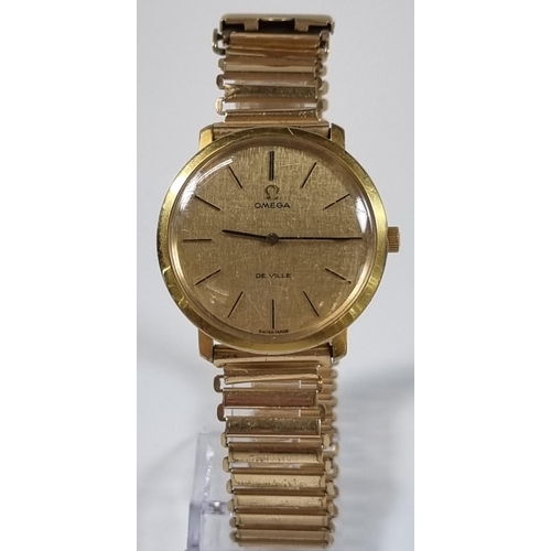 416 - Omega De Ville gold plated gentleman's wristwatch with gold satin face, having baton numerals on an ... 