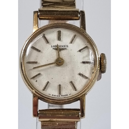 419 - Longines 9ct gold ladies wristwatch with satin face, having baton numerals and 9ct gold bark finish ... 