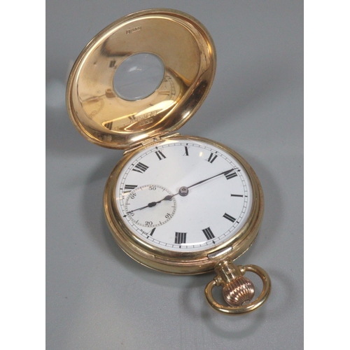 424 - 9ct gold half hunter keyless top wind pocket watch with white enamel face, having Roman numerals and... 