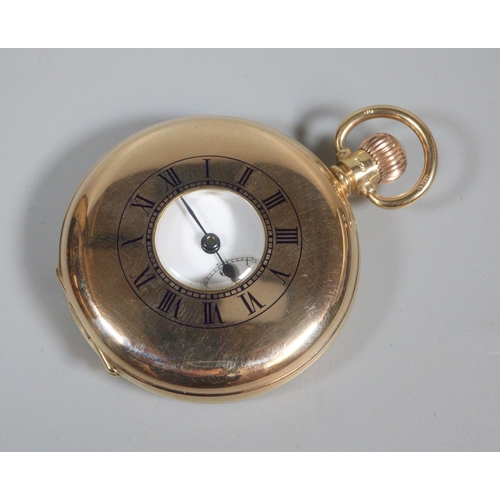 424 - 9ct gold half hunter keyless top wind pocket watch with white enamel face, having Roman numerals and... 