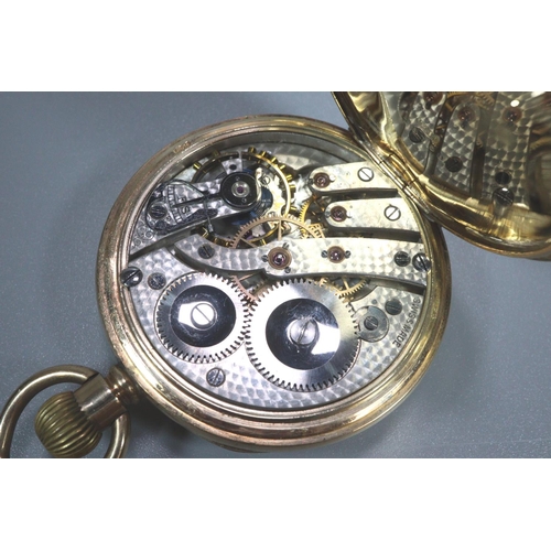 427 - 9ct gold open faced keyless top wind pocket watch, having white enamelled face with Arabic numerals ... 