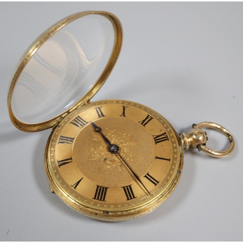 429 - 18ct gold open faced key wind fancy fob watch with foliate engraved back and engine turned Roman fac... 