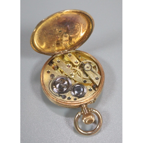 430 - 14ct gold open faced keyless top wind fancy fob watch, having white enamelled Roman face and foliate... 