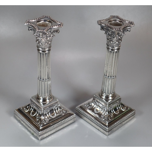 439 - Pair of Edward VII Corinthian column silver candlesticks by James Dixon & Sons Ltd. Sheffield 1902 w... 