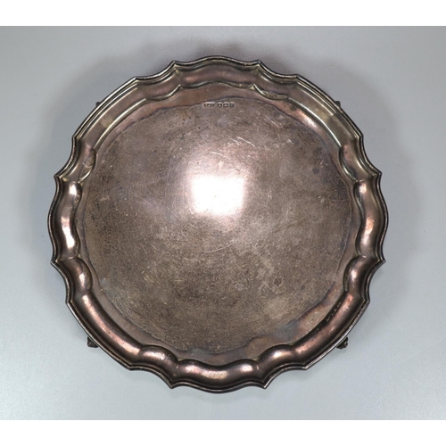 442 - Small silver piecrust salver standing on four scroll feet, maker's initials R&D, Sheffield hallmarks... 