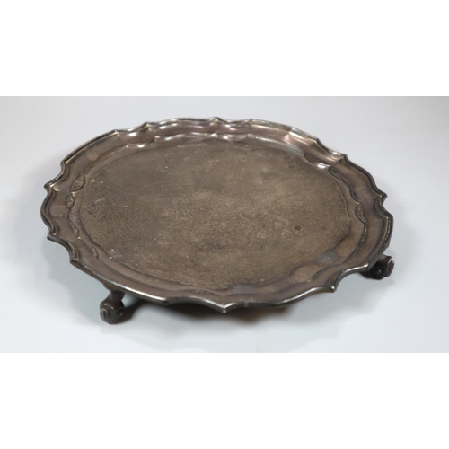 442 - Small silver piecrust salver standing on four scroll feet, maker's initials R&D, Sheffield hallmarks... 