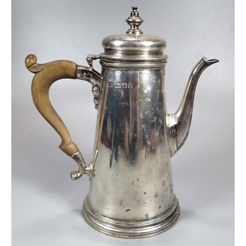 445 - George V silver conical shaped coffee pot with turned wooden handle.  Makers initials W E B, London ... 