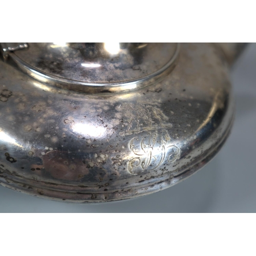 446 - 19th century silver bullet shaped teapot with acanthus leaf moulded decoration to the handle, armori... 