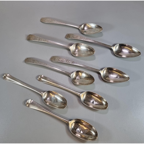 462 - Group of eight Georgian 18th and early 19th century Irish silver table spoons, some with Bright Cut ... 