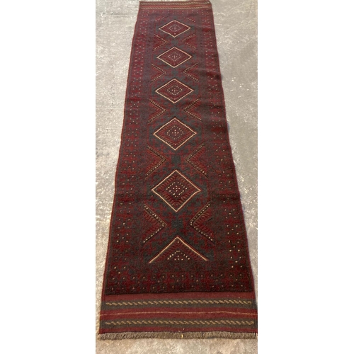 481 - Full wool pile hand woven Afghan Meshwani runner with central geometric medallion design together wi... 