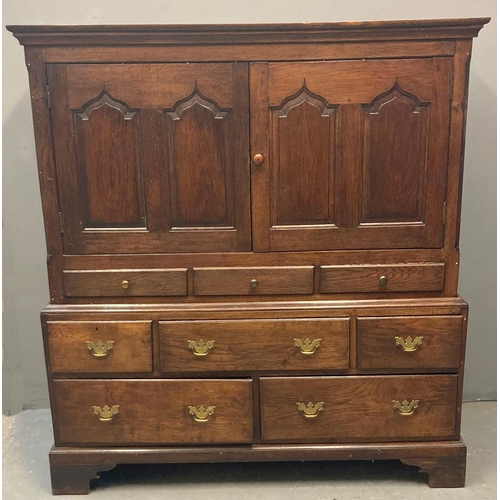 70 - Early 19th century Welsh oak Cardiganshire two stage press cupboard, the moulded cornice above two b... 