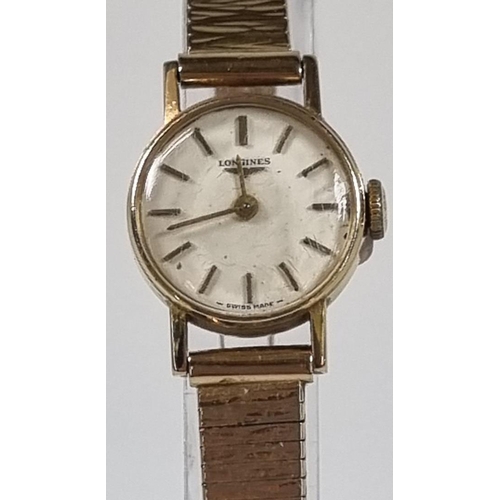 419 - Longines 9ct gold ladies wristwatch with satin face, having baton numerals and 9ct gold bark finish ... 