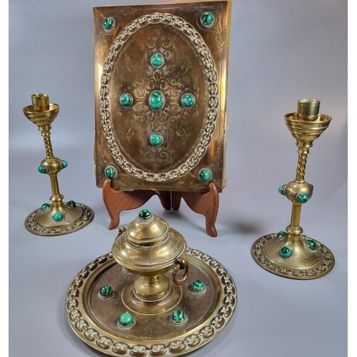 465 - G Betjemann & Sons, a collection brass Arts & Crafts desk items, to include: pair of candlesticks, s... 
