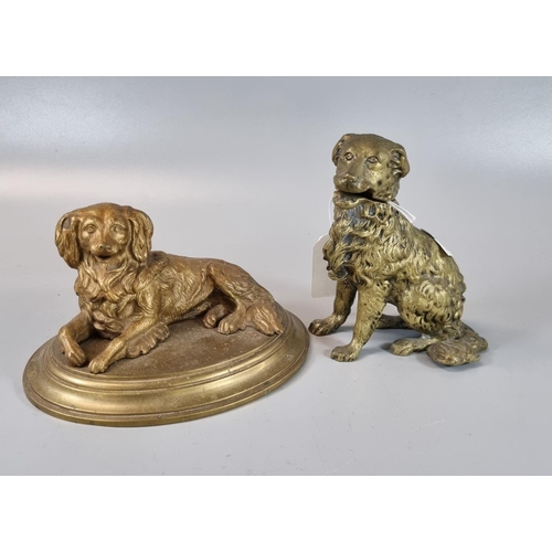 106 - Gilt metal inkwell in the form of a recumbent Spaniel on brass moulded base, together with another b... 