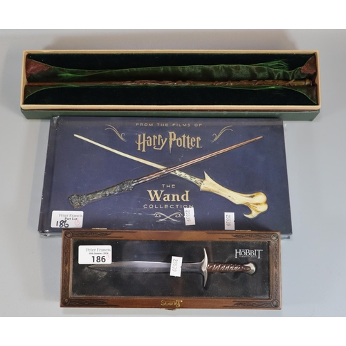 186 - From the films of Harry Potter, 'the Wand Collection', sealed, together with a Harry Potter style wa... 