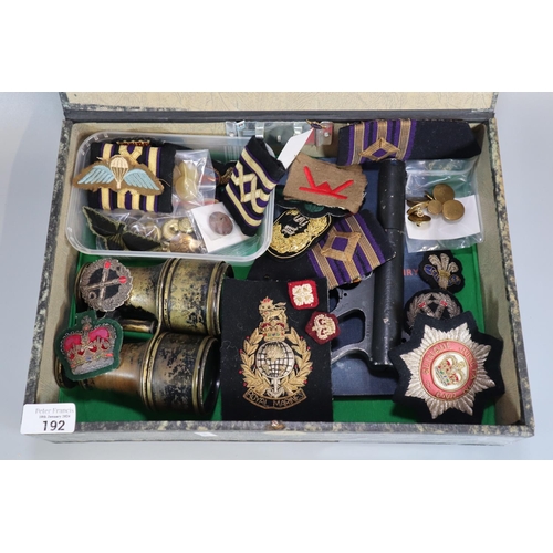 192 - Box of assorted Army insignia and badges to include: cap badges, Naval epaulettes, Welsh Infantry Fo... 