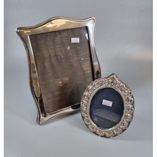 205 - Silver Art Nouveau style easel picture frame together with another silver oval easel picture frame w... 