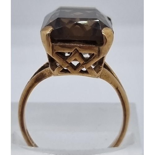 215 - 9ct gold and smoky quartz dress ring, Birmingham hallmarks.  5.7g approx.  Size N1/2.   (B.P. 21% + ... 